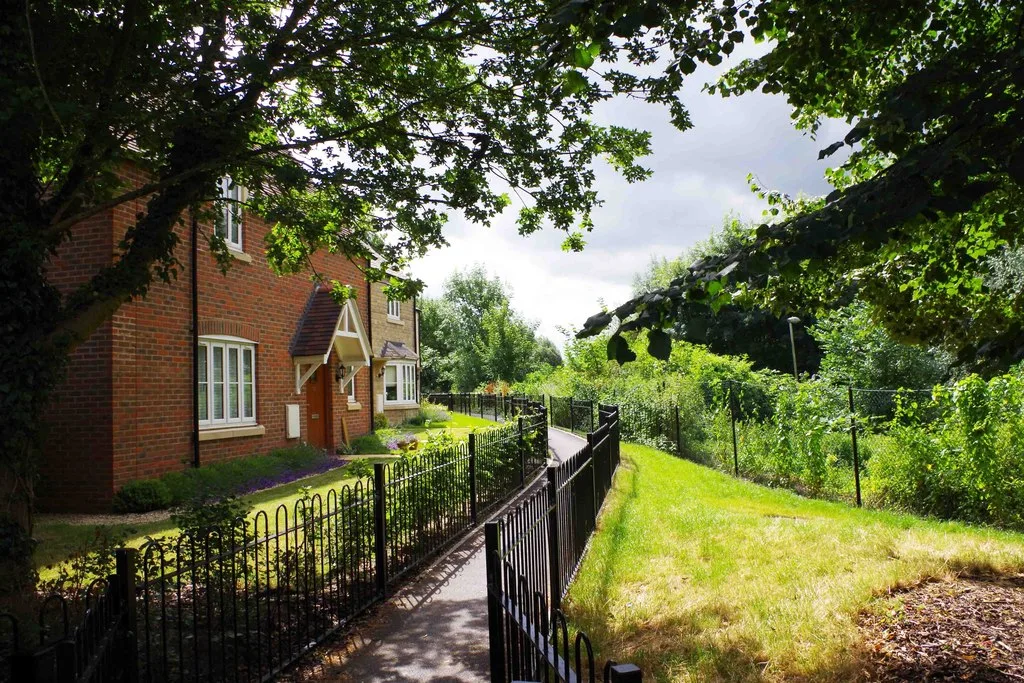 New homes beside a footpath in Witney. The picture does not show social rented homes or any site in the draft plan
