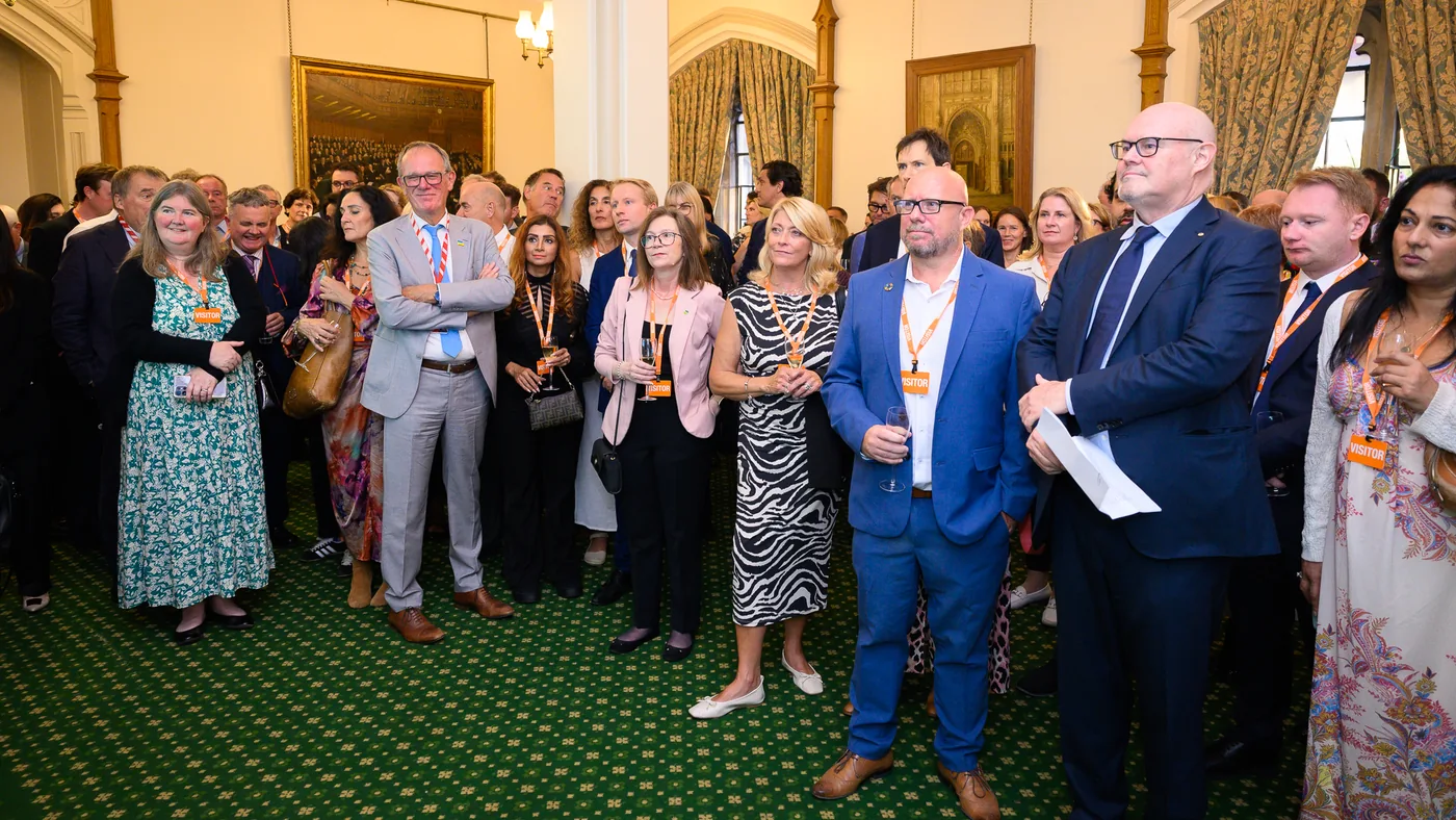 Guests standing with drinks at the Political Purpose Awards ceremony